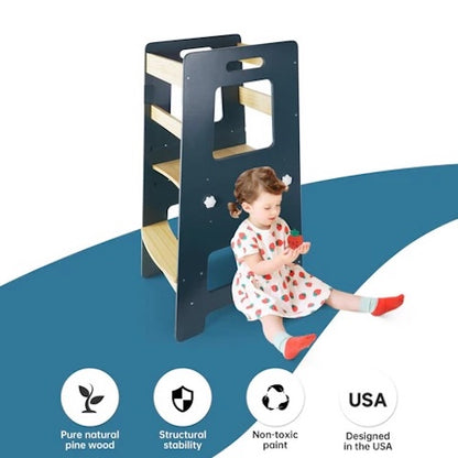 Child playing with a wooden climbing toddler tower nz